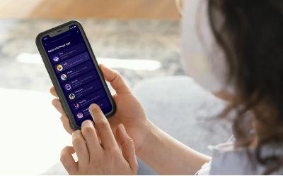 Woman selecting a Community and Buddy Challenges in the BetterYou